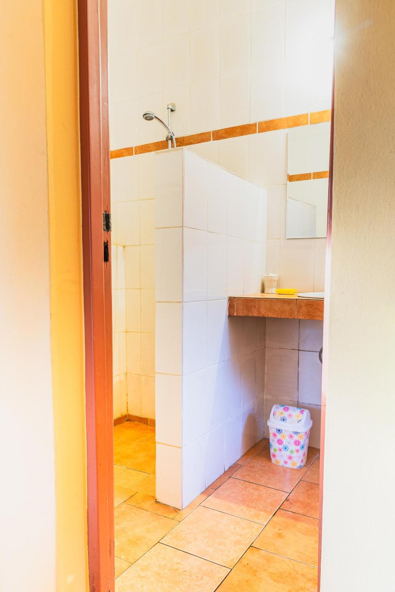 Aparthotel Jardin Tropical Bujumbura Buitenkant foto
